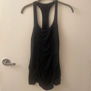 Lululemon tank good for running or yoga. Pre-2010 era